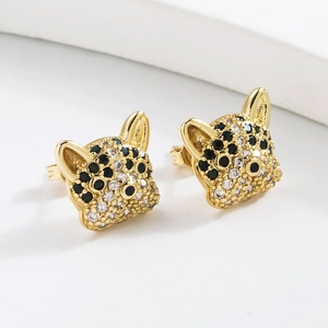 Golden leopard head stud earrings with sparkling black and white cubic zirconia