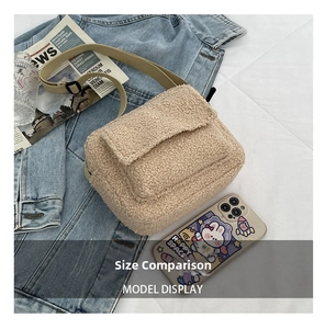 Beige faux fur crossbody bag shown next to a smartphone to demonstrate the compact size