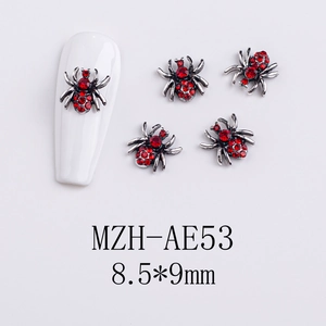 Detailed view of red rhinestone spider nail charms with 8.5x9mm dimension specs