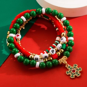 Detail of Christmas beaded bracelet set with HAPPY letters and golden snowflake charm