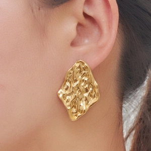 Golden irregular geometric earrings with vintage lava texture for a luxury bold style