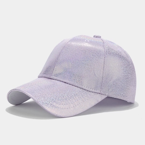 Detailed close-up of lavender holographic glitter fabric on a structured baseball cap