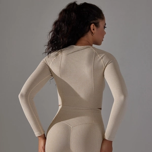 Detail of honeycombed texture on back of beige seamless high-elastic yoga long sleeve top