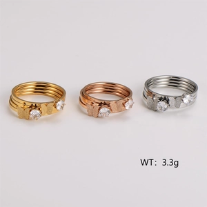 Minimalist butterfly rings set with sparkling zircons in gold, rose gold and silver