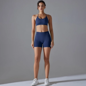 Navy blue seamless high-stretch sports bra and shorts set for yoga and fitness training