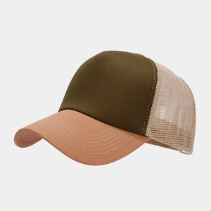 Detail of the olive green and brown mesh trucker hat with durable reinforced stitching