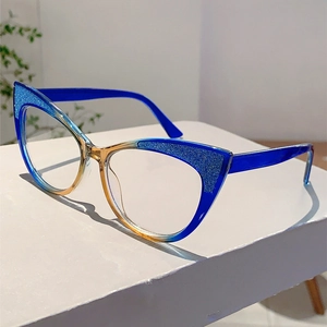 Detail of blue and yellow gradient cat-eye frame with subtle glitter finish on the top