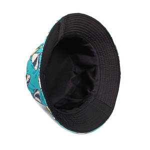 Reversible bucket hat with cartoon shark print and plain black side for outdoor sun protection