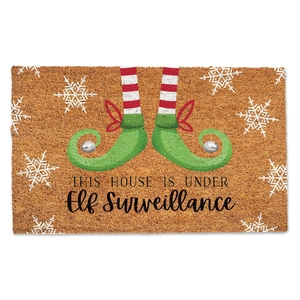 Macro detail of coconut fiber Christmas doormat with Elf Surveillance print