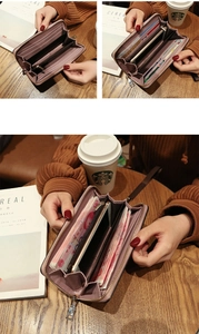 Detail of long zippered wallet interior with multiple card slots and smartphone compartment