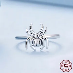 S925 sterling silver spider open ring with detailed texture on a light blue background