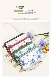 Detail of multi-color butterfly print long wallets with dual zippers and wrist straps