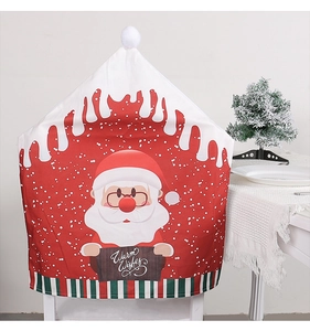 Détail de la housse de chaise Père Noël rouge avec signe Warm Wishes et rayures