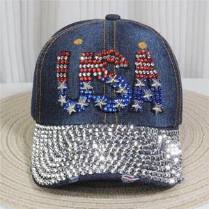 Detail of denim baseball cap with USA rhinestone letters and silver spiked studs