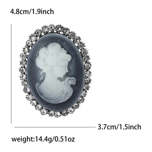 Detailed dimensions of vintage cameo brooch with rhinestones: 4.8cm height by 3.7cm width