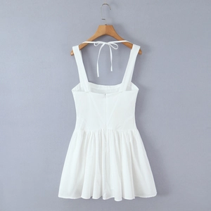 Detailed back view of white square neck dress with wide straps and hidden zipper