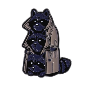 Cute enamel brooch featuring three purple raccoons in a beige trench coat design