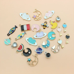 Assorted colorful enamel moon and star charms with rhinestones for DIY jewelry making