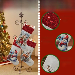 Detail view of sequined Christmas stockings with digital printed Santa and reindeer