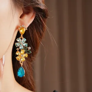 Vintage floral tassel earrings with colorful rhinestones and gold drop charms