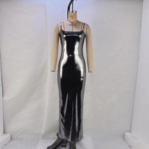 Detailed view of the dark grey metallic fabric and spaghetti straps on the slim dress