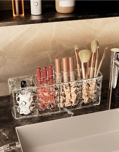 Detail view of transparent acrylic organizer with water ripple texture and 4 compartments