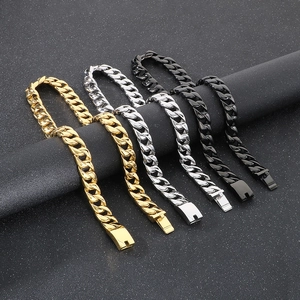 15mm stainless steel Cuban link necklace in gold, silver, and black on display