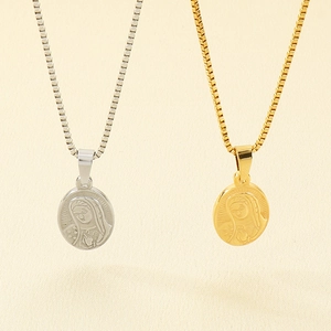 Vintage oval Virgin Mary necklaces in gold and silver steel with classic box chain