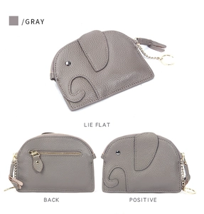 Macro detail of elephant leather coin purse in gray with pebble texture and gold zipper