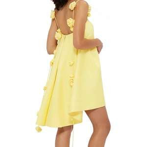 Women's bright yellow satin slip dress featuring 3D floral appliques and open back design