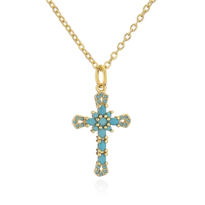 Detailed view of an 18K gold plated cross pendant with micro-set turquoise stones