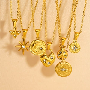 Golden stainless steel necklaces featuring celestial sun moon and star coin pendants