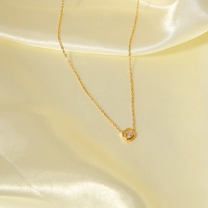 Minimalist gold plated stainless steel necklace with hexagon zircon pendant on silk