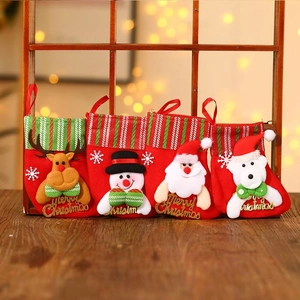 Detailed view of 4-pack Christmas stockings with reindeer, snowman, and Santa characters
