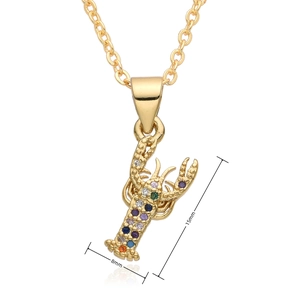 Detail showing small gold turtle pendant size 15x8mm with colorful zircon stones