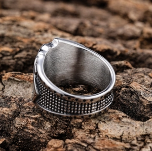 Men's vintage stainless steel ring with studded texture and brushed metal inner surface