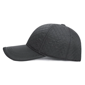 Men's winter baseball cap with black quilted pattern and ear protection for cold weather