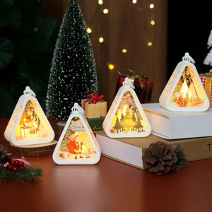 Set of four white vintage Christmas LED lanterns with Santa and snowman illustrations