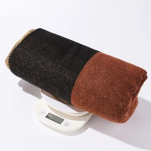 Detail showing high-quality double-sided knit scarf weight 480g on digital scale