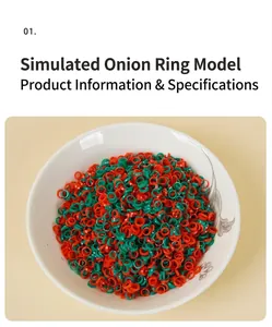 Macro shot of realistic PVC faux green onion and chili rings in a white ceramic bowl