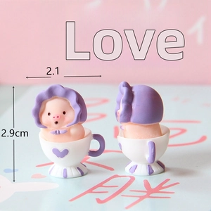 Two cute miniature resin pig figurines in teacups for micro landscape decoration