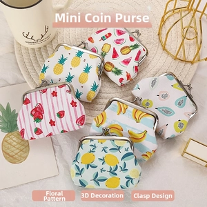 Mini fruit print coin purses with retro metal buckles shown in various colorful patterns