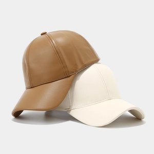 Classic PU leather baseball caps for men in brown and cream colors with a smooth finish