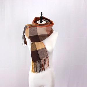 Classic oversized check scarf with tassels in earthy brown and beige tones for autumn