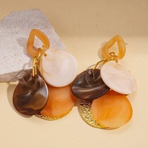 Boho acrylic geometric tassel earrings with orange and marble resin discs on gold metal