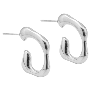 Macro shot of silver-colored 304 stainless steel earrings with irregular fluid design
