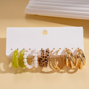 Detail view of 6-pair earring set with leopard print and faux pearls on display card