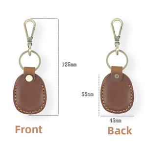 Detailed view of brown leather keychain case showing front and back with dimensions