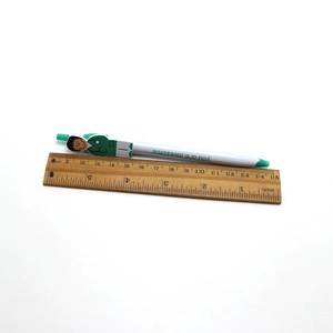 Detail shot of a 14.5cm cartoon nurse pen with green grip and you are awesome text