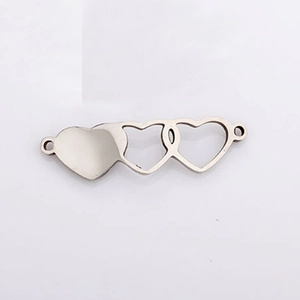 Close-up of heart-shaped magnetic clasp in alloy metal for DIY jewelry making